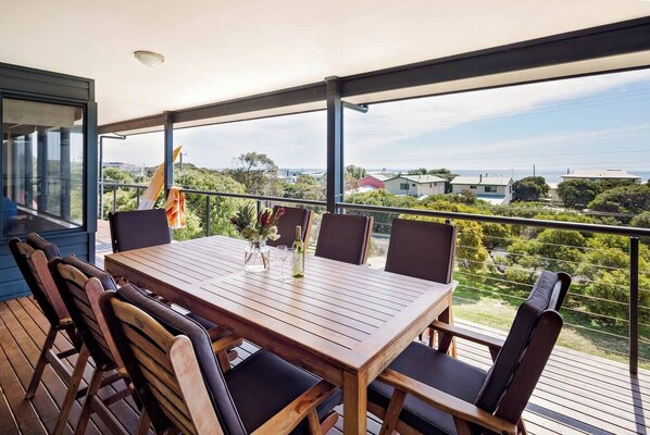 Enjoy alfresco meals or golden hour tea from the deck, where every sunset is a show.