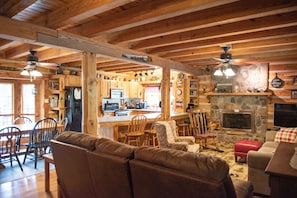 View of living room and dining area and kitchen