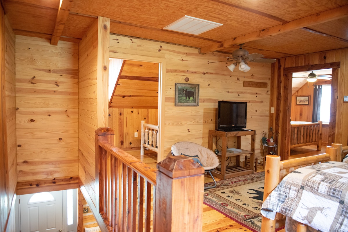 Rustic Log Lodge Overlooking Water