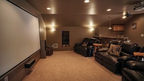 THEATER ROOM WITH 6 ELECTRIC RECLINING CHAIRS