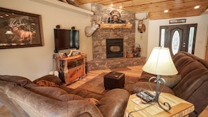 COZY FAMILY ROOM WITH WOOD BURNING FIREPLACE