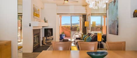 A view of the great room from the kitchen through to the patio