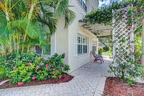 Lovely outdoor patio of the end unit condo.  Peaceful and pretty!