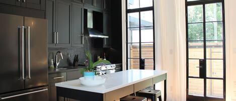 Beautiful bright kitchen - overlooks your private garden courtyard!