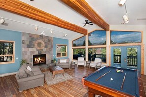 Lobby with pool table, games, computer, deck, firepit and movie rentals