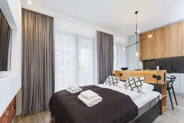 Comfortable double bed in the living room.