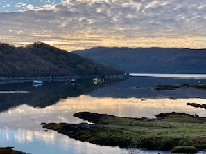 Morning sun across the bay, you may see seals, the otter or pine martens