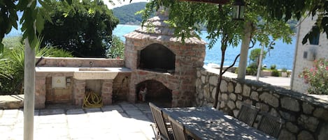 Seaside Front Garden with Barbeque and Dining Area