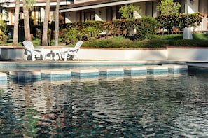 Large pool with stepping stones to relax on