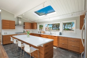 Chefs Kitchen with all top of the line appliances. Wolf Oven and Range.