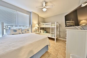 3rd bedroom with queen bed and twin size bunkbed.