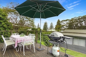 Large back verandah - BBQ / outdoor eating & reclining chairs etc