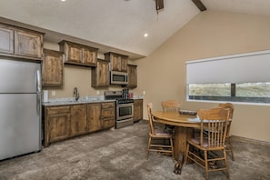 Full kitchen with views to the ponds 