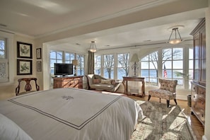 This Main Bedroom has a stunning view of the bay.