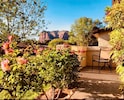 Charming front patio with red rock view