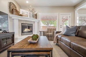 This is where the streaming takes place fireside in the spaciously seated Living Room