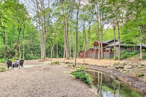 Exterior | Fire Pit | On-Site Stream | Wooded Lot