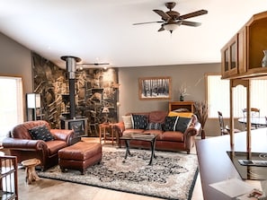 Leather seating in living room with views of the lake