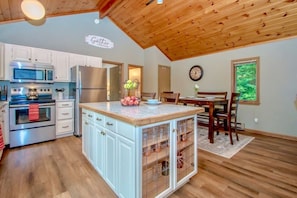 
Full kitchen with seating for the whole family.  Yes those are Moscow mule glasses, or they work for wine too.  Enjoy our snack station with some warm cocoa.