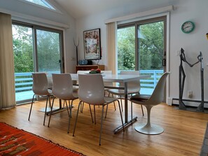 Dinning room with view of wraparound deck. 