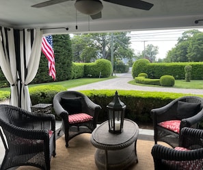 Front covered porch with ceiling fan
