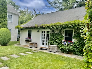Cottage for entertaining and housing guests.
