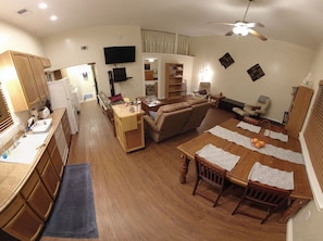 Main living area from Stove with view of Bathroom and Bedroom