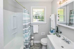 Bathroom has starter soaps and paper products. Linen closet with extra towels. 