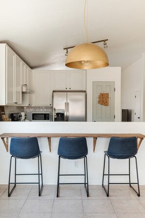 The open kitchen area, as seen from the dining room.