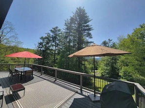 Large upper deck with a grill to relax and entertain