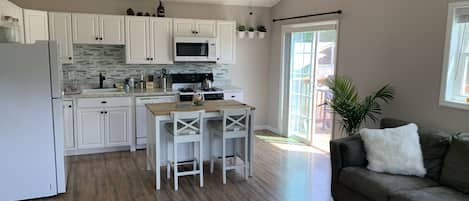 Living Room and Kitchen.