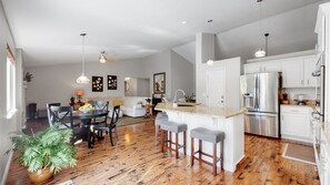 Seating for 4 at the kitchen table and seating for 4 at the kitchen island. 