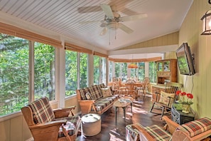 The sunroom is perfect for your group of 6 to spend quality time together.