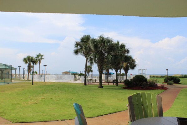 Walk out patio door to pools or the beach!