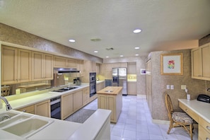 Prepare delicious meals in the fully equipped kitchen.
