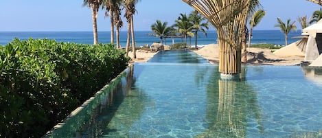 Community infinity pool, leading to lap pool.