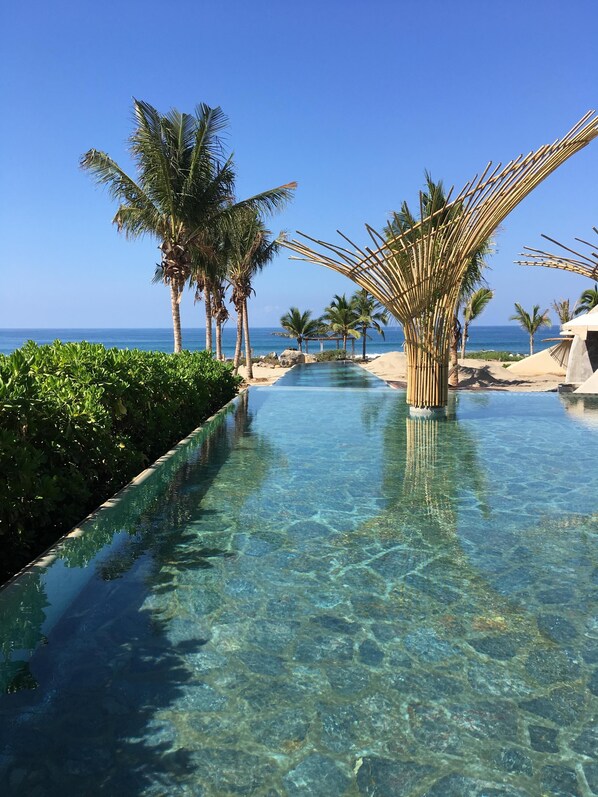 Community infinity pool, leading to lap pool.