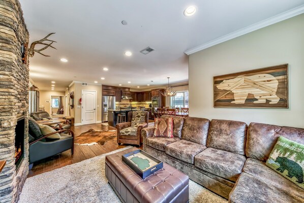 Curl up on the leather sectional to chat around the fireplace or watch a movie on the HDTV