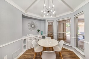 The lovely breakfast area connects to the kitchen and living room.