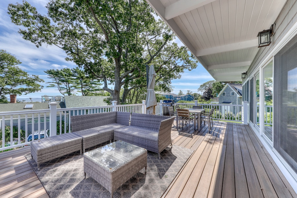 A beautiful balcony on a sunny day overlooks the ocean