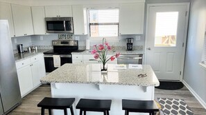 Newly updated kitchen ready for socializing and cooking!