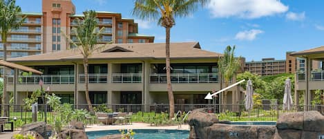 1st Floor walkout, steps to the pool