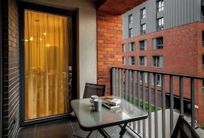 Atmospheric balcony with garden furniture, where the guests can enjoy their morning coffee or snacks.