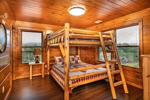 Our bunk room has queen bunk beds. It is located on the second floor - right next to the game room!