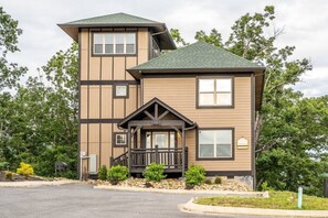 Your perfect Pigeon Forge vacation awaits in this luxurious 4 bedroom, 3 bath cabin that comfortably sleeps 13!