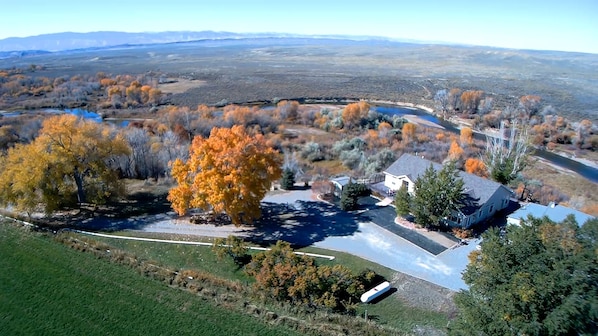 Notice the Popo Agie River just behind the house?  River access and seclusion!