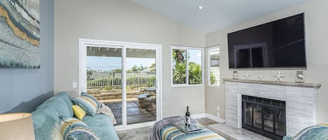 Ocean view! Fresh remodeled modern living room, gas fireplace, 65" smart TV!