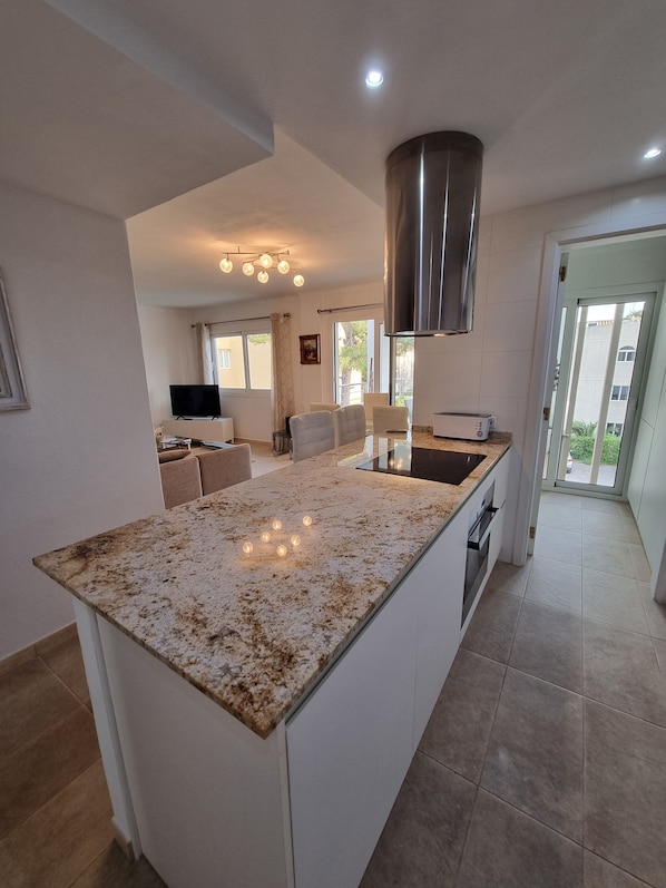 Kitchen and living room.