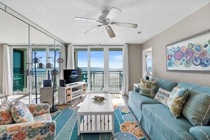 Relax in the spacious, bright living room with a cozy vibe