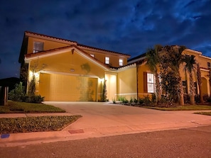 A beautiful view of the house at sunset.